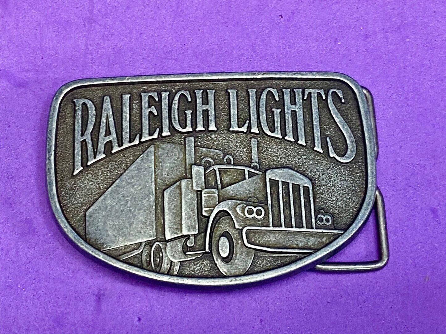 Vintage Belt Buckle Raleigh Lights Cigarette Trucker Trucking Cigarettes