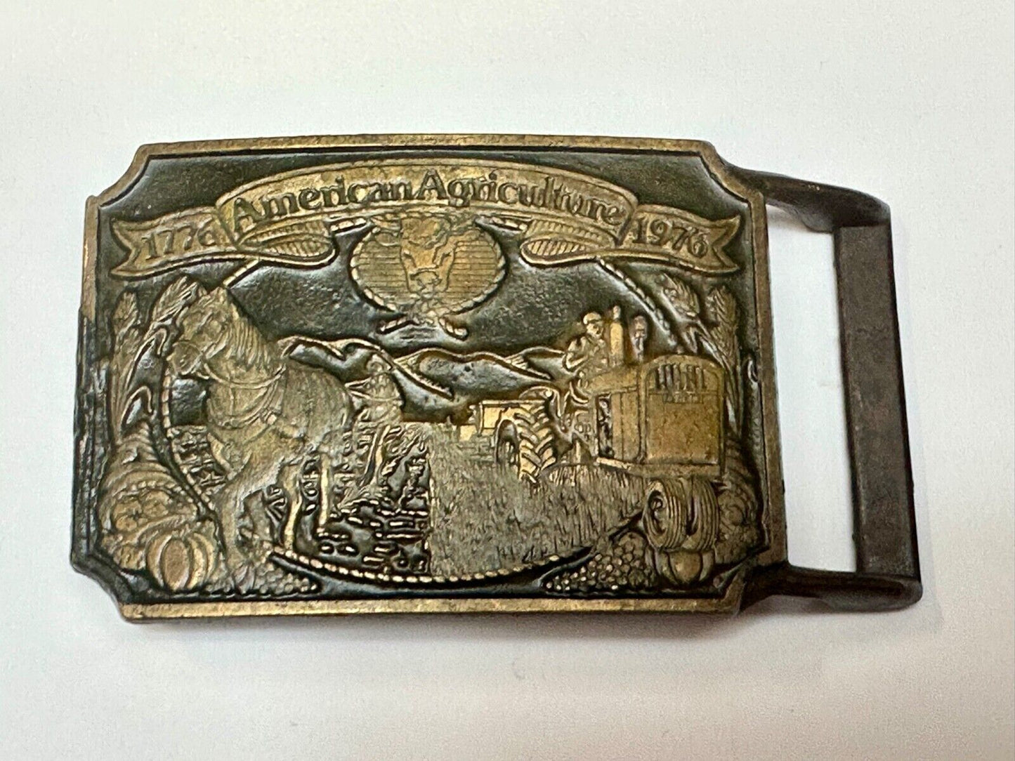 Bicentennial American Agriculture Horse to tractor, Vtg belt buckle by Ortho