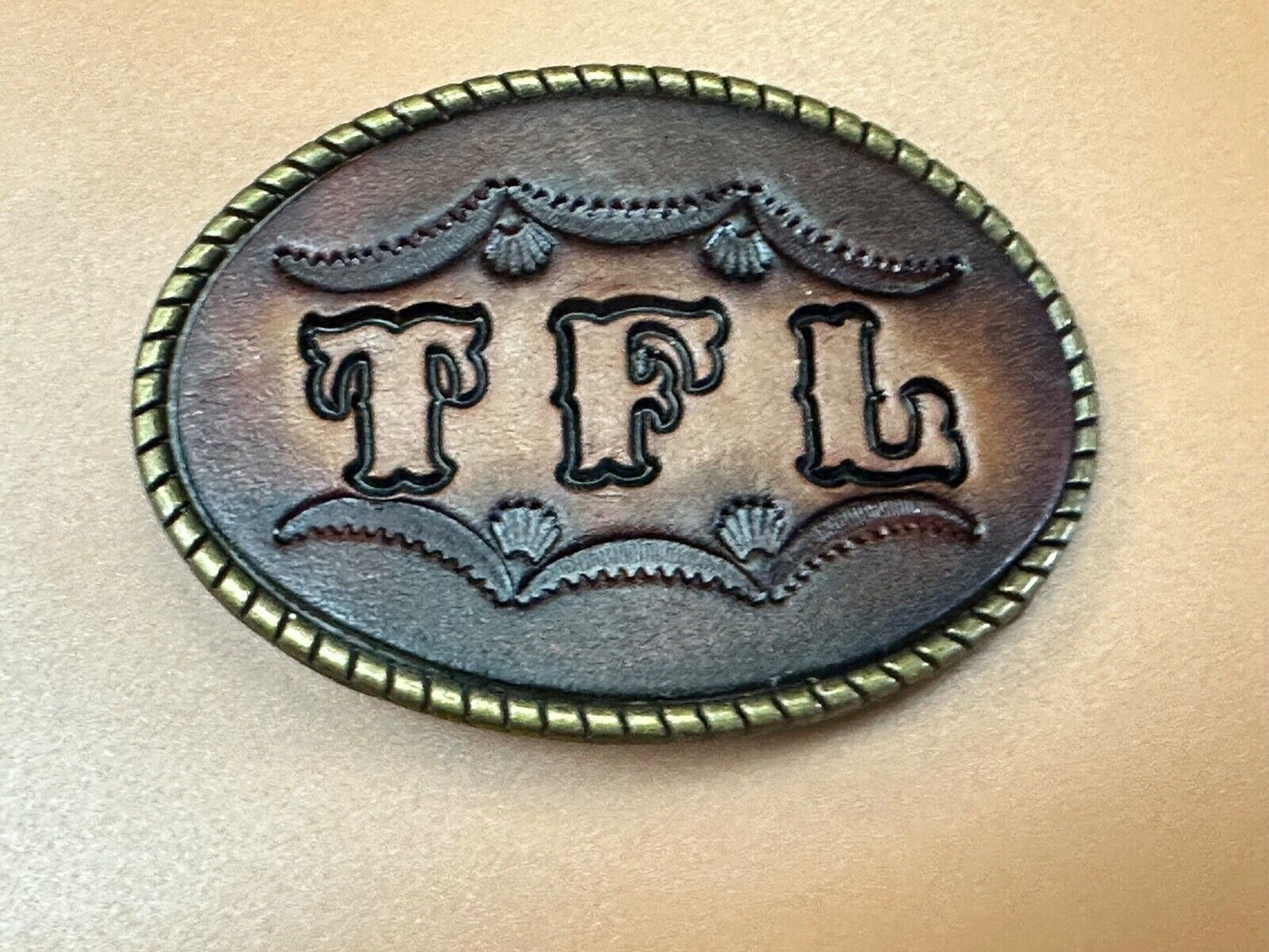 TFL. vintage western initials letters on leather belt buckle