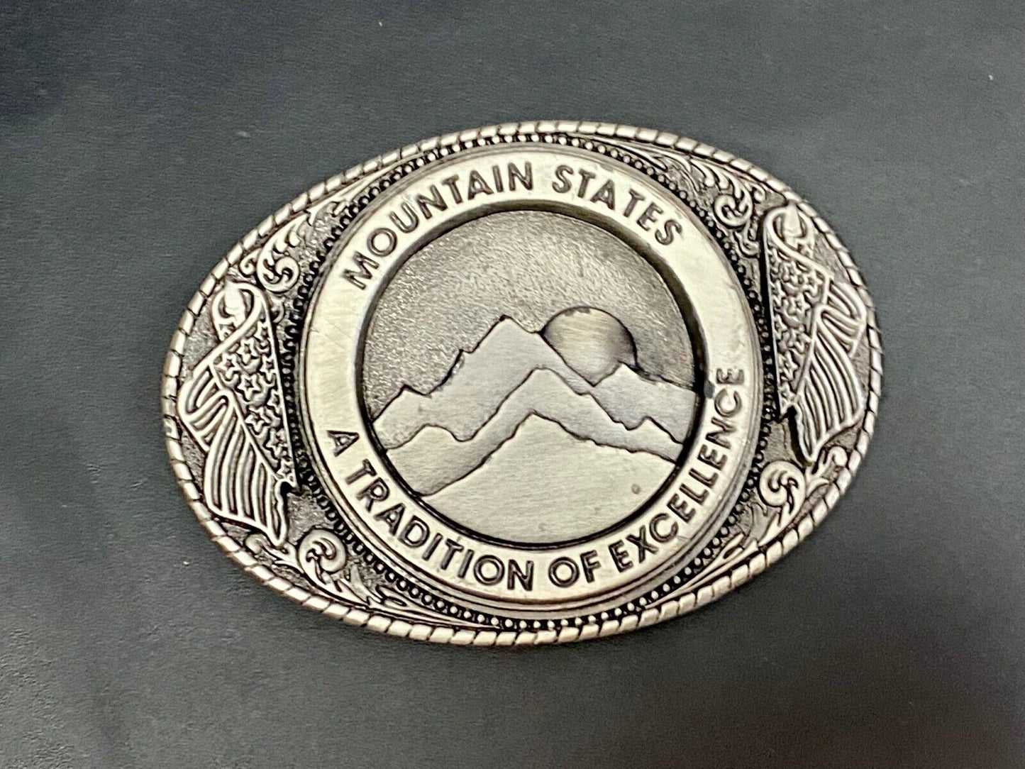 The Mountain States A Tradition Of Excellence Western Oval Belt Buckle