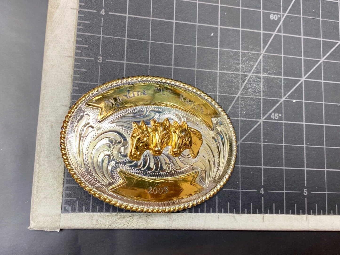 Three Horse heads silver tone? western belt buckle from Mexico- engraved ribbon