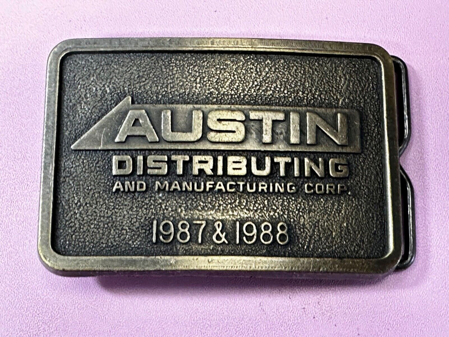 Austin Texas Distributing and Manufacturing 1987 Advertisement Promo Belt Buckle