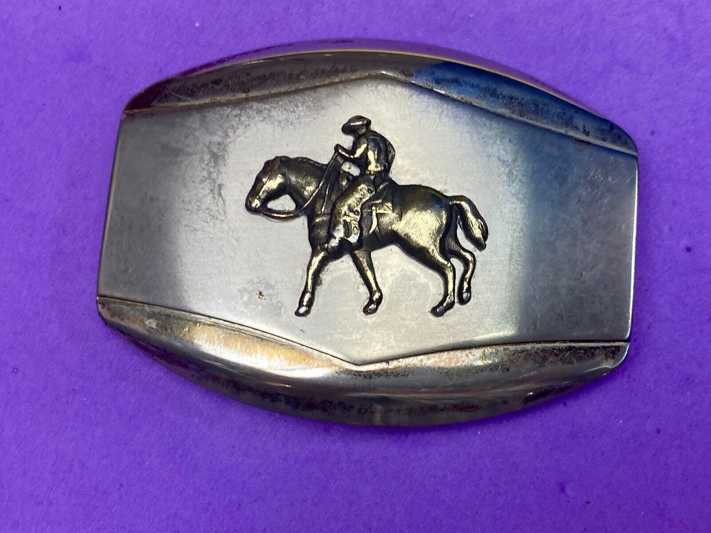 Vintage belt buckle Horseback old west cowboy riding the trail