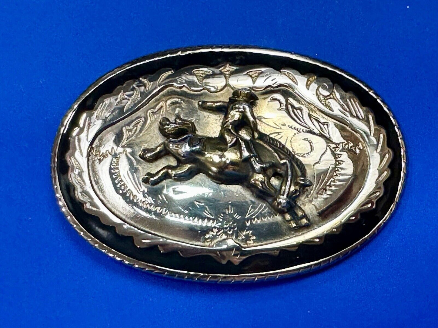 Beautiful Cowboy Saddle Bronc western black silver gold color belt buckle
