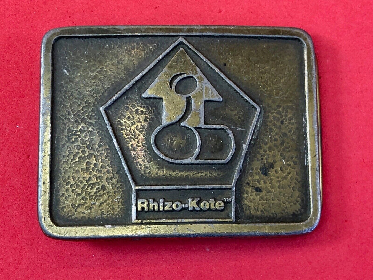 Vintage advertising Rhizo kote seal coating company belt buckle