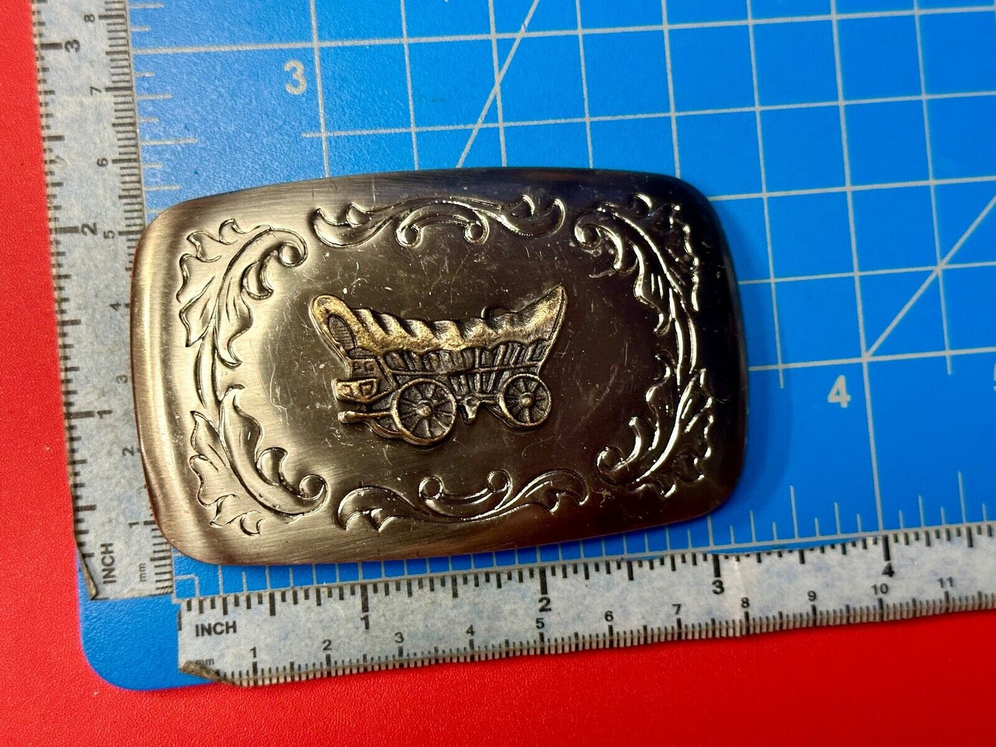Vintage covered wagon two tone western mixed metal belt buckle