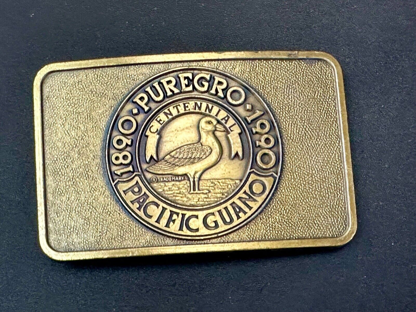1990 Puregro Pacific Guano Centennial Celebration vintage belt buckle