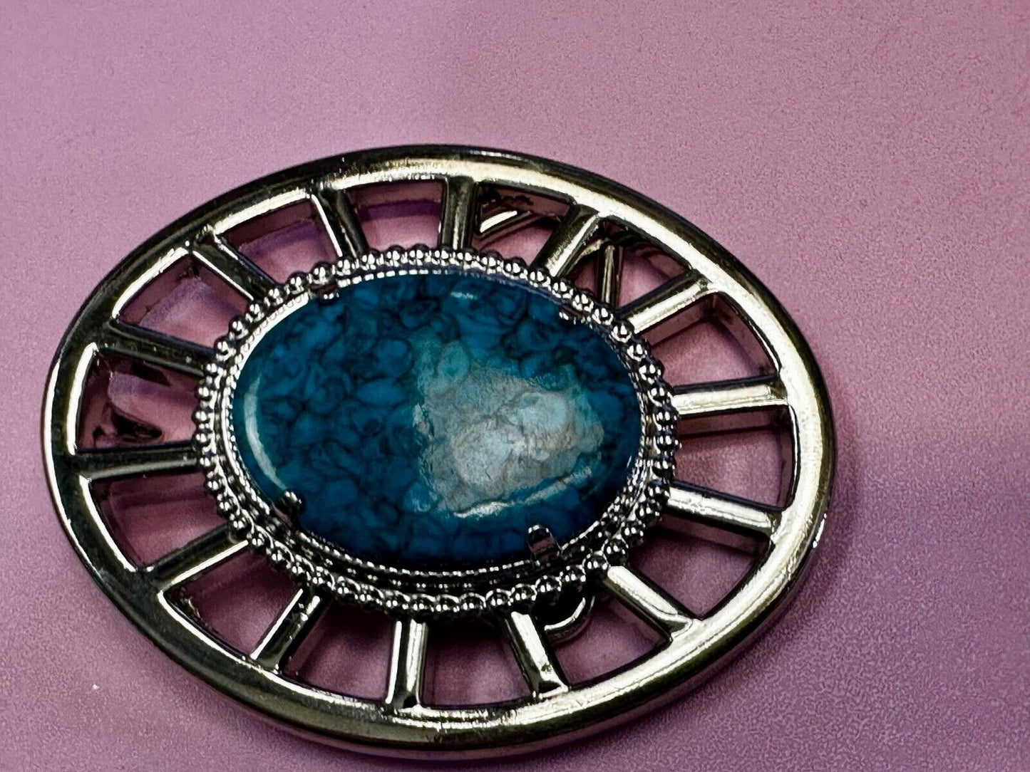 Synthetic Turquoise in unique see through silver tone round Belt Buckle