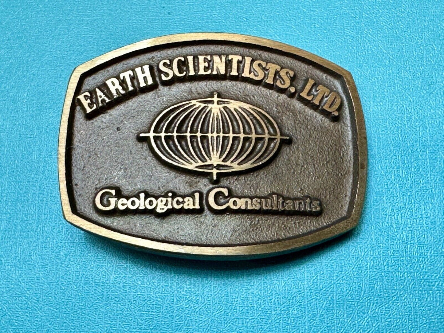 Vintage Earth Scientists LTD 0 Geological Consultants advertising belt buckle