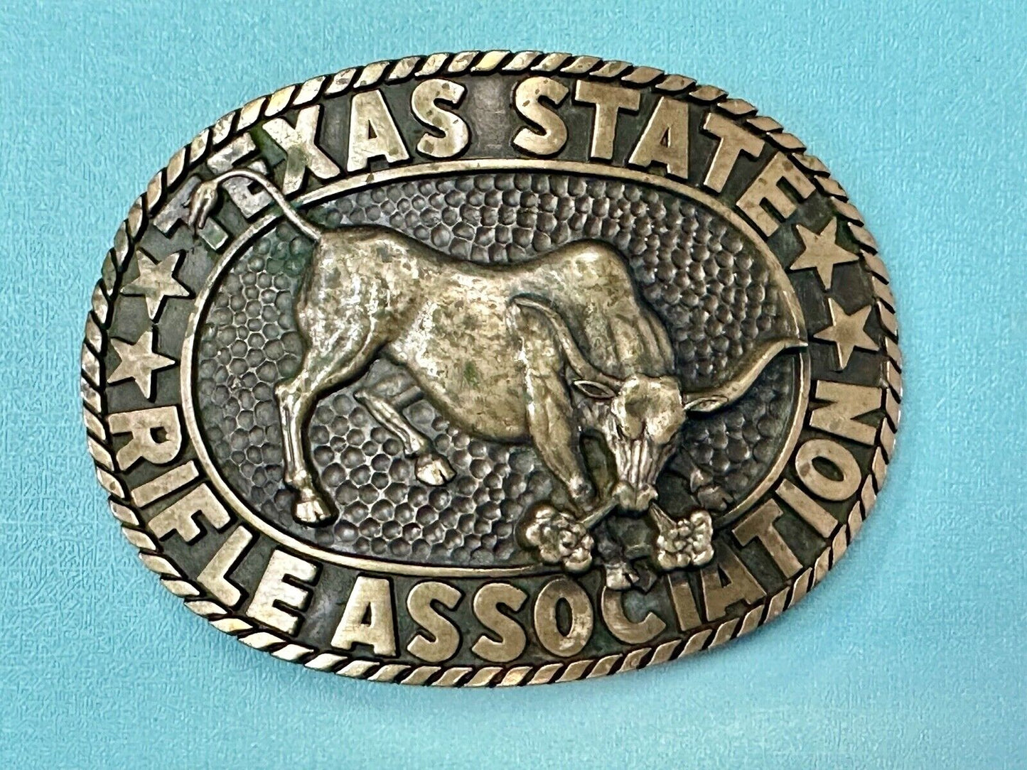 Texas State Rifle Association Charging longhorn Hunting Norman Co. belt buckle