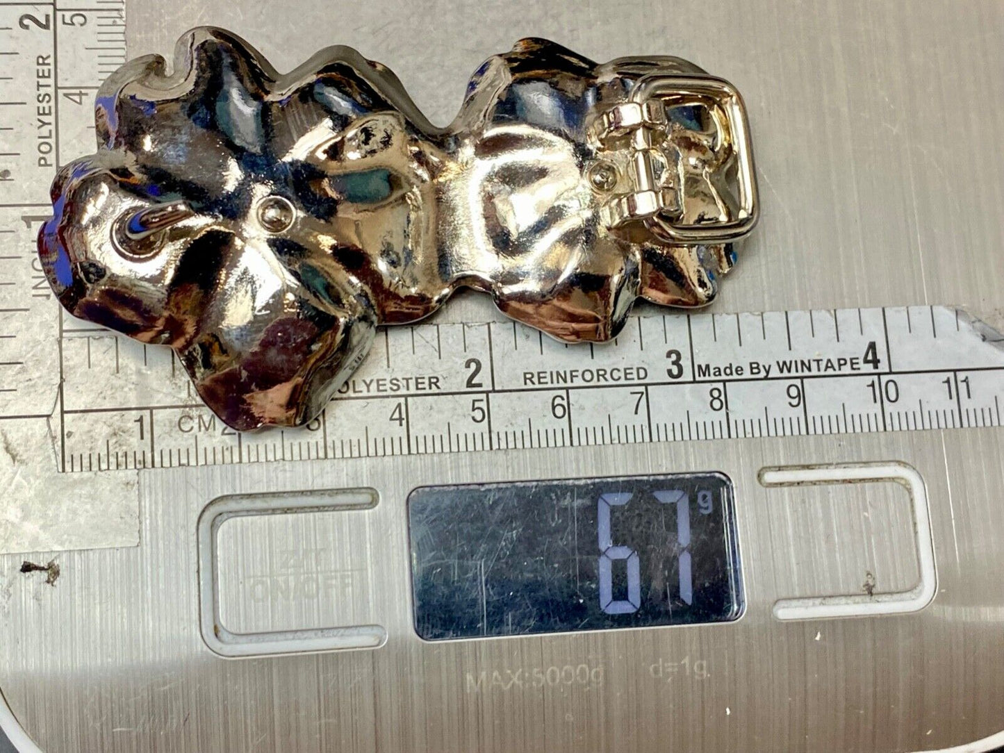 Beautiful two figural flowers with jewels as black & silver colored belt buckle