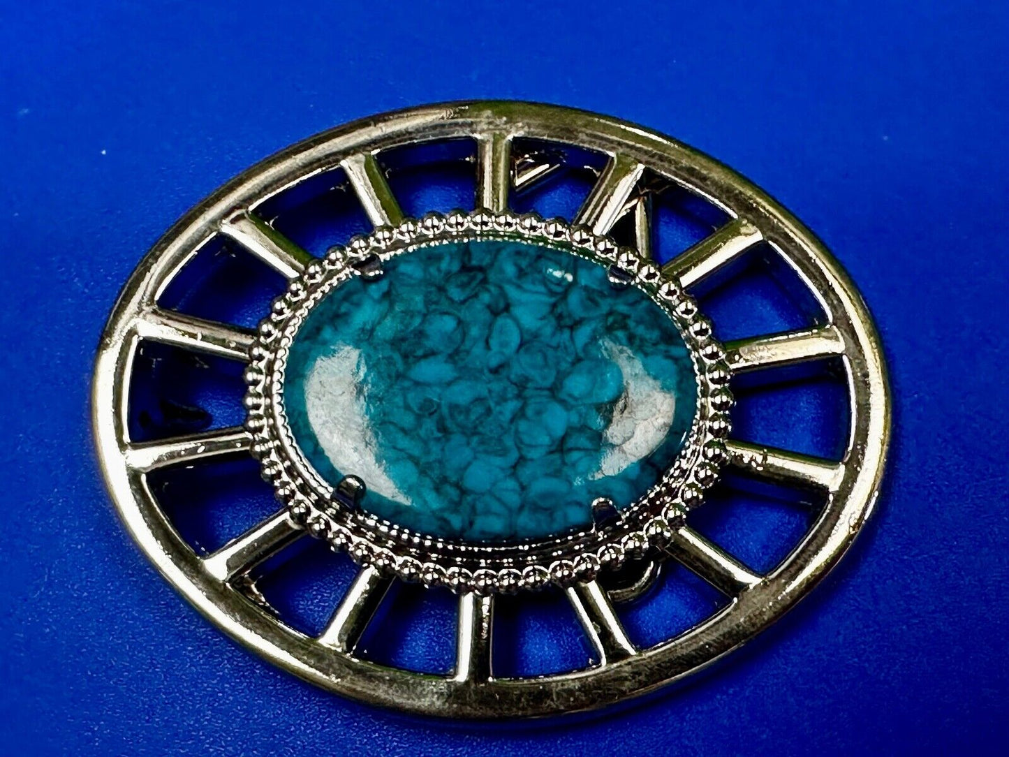 Synthetic Turquoise in unique see through silver tone round Belt Buckle