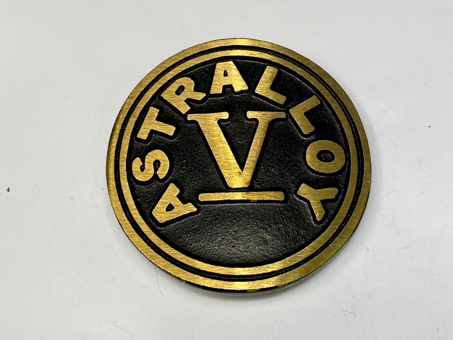 Astralloy Vis a unique, deep-air hardened steel promotional brass belt buckle