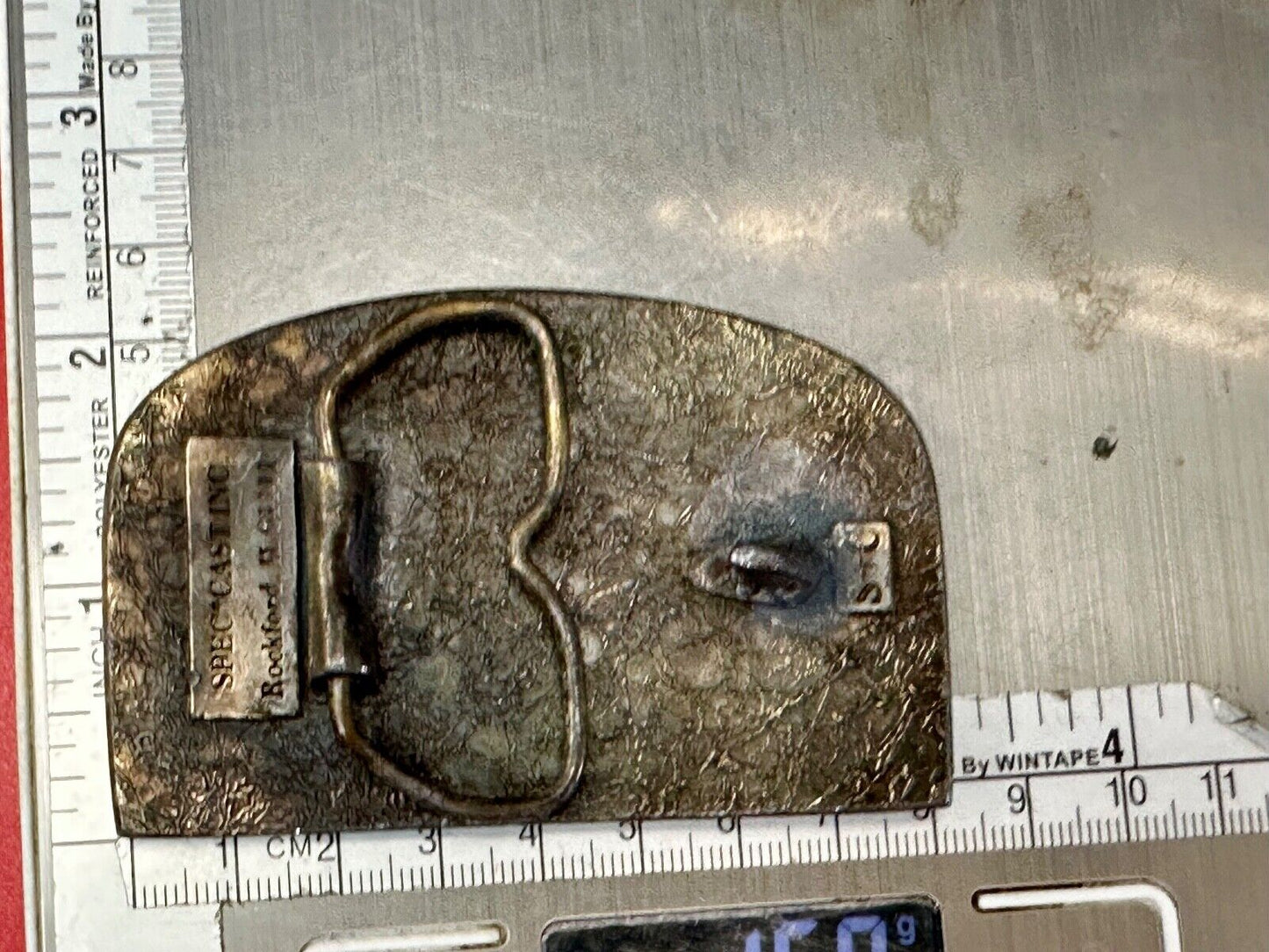 The Tough Tire Team BRi Brad Ragan, Inc. vintage belt buckle by Spec-Cast