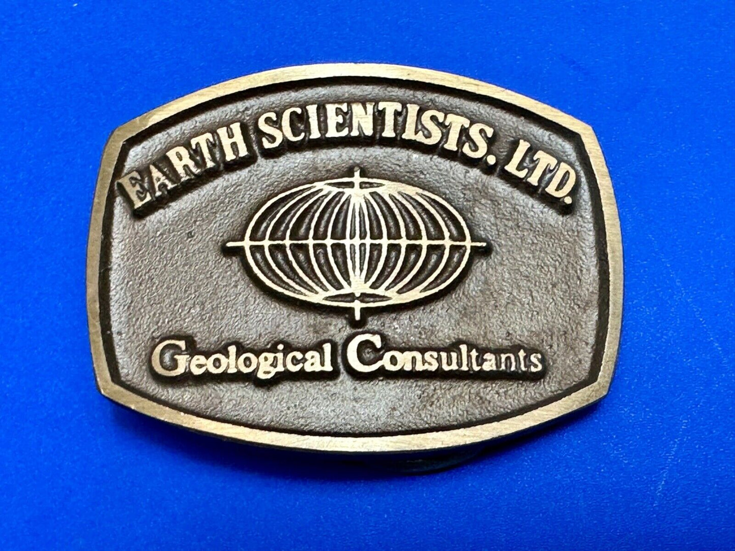 Vintage Earth Scientists LTD 0 Geological Consultants advertising belt buckle