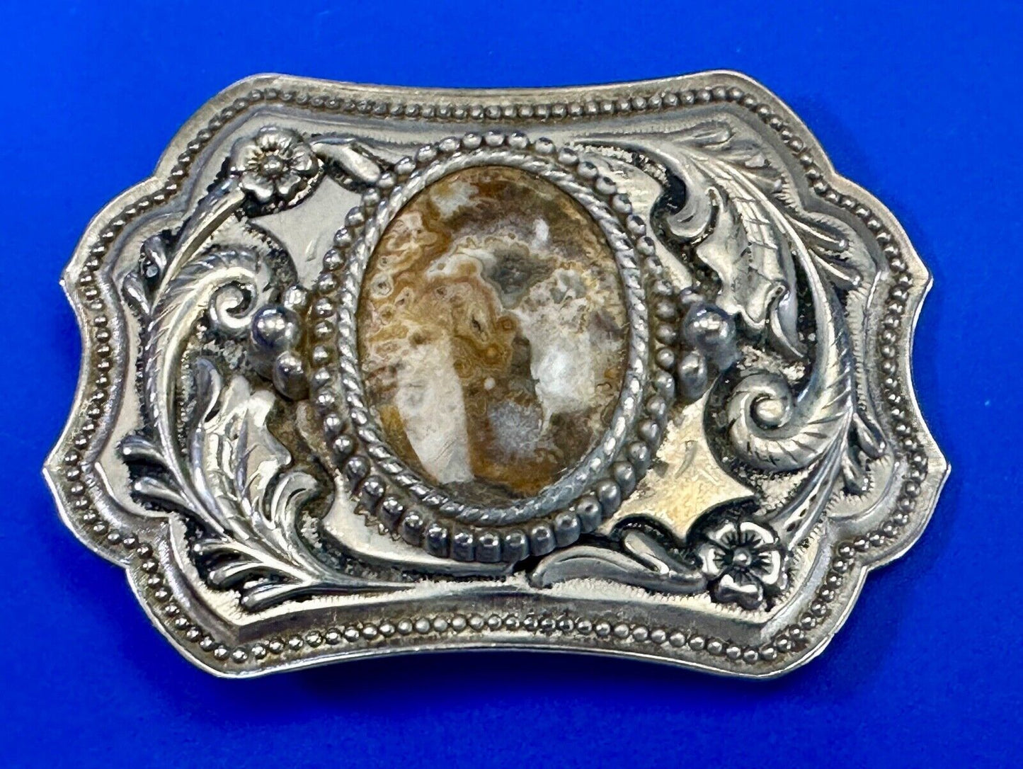 Vintage cabochon cab stone centerpiece on western silver tone belt buckle