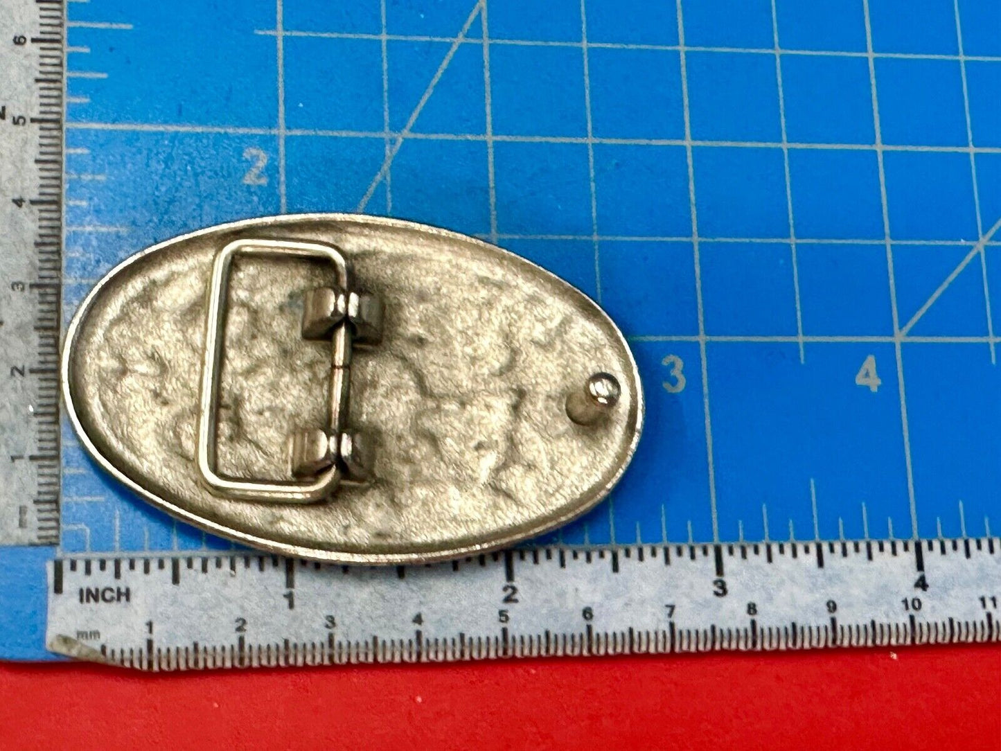 Vintage Cluster Centered in southwestern pattern oval belt buckle
