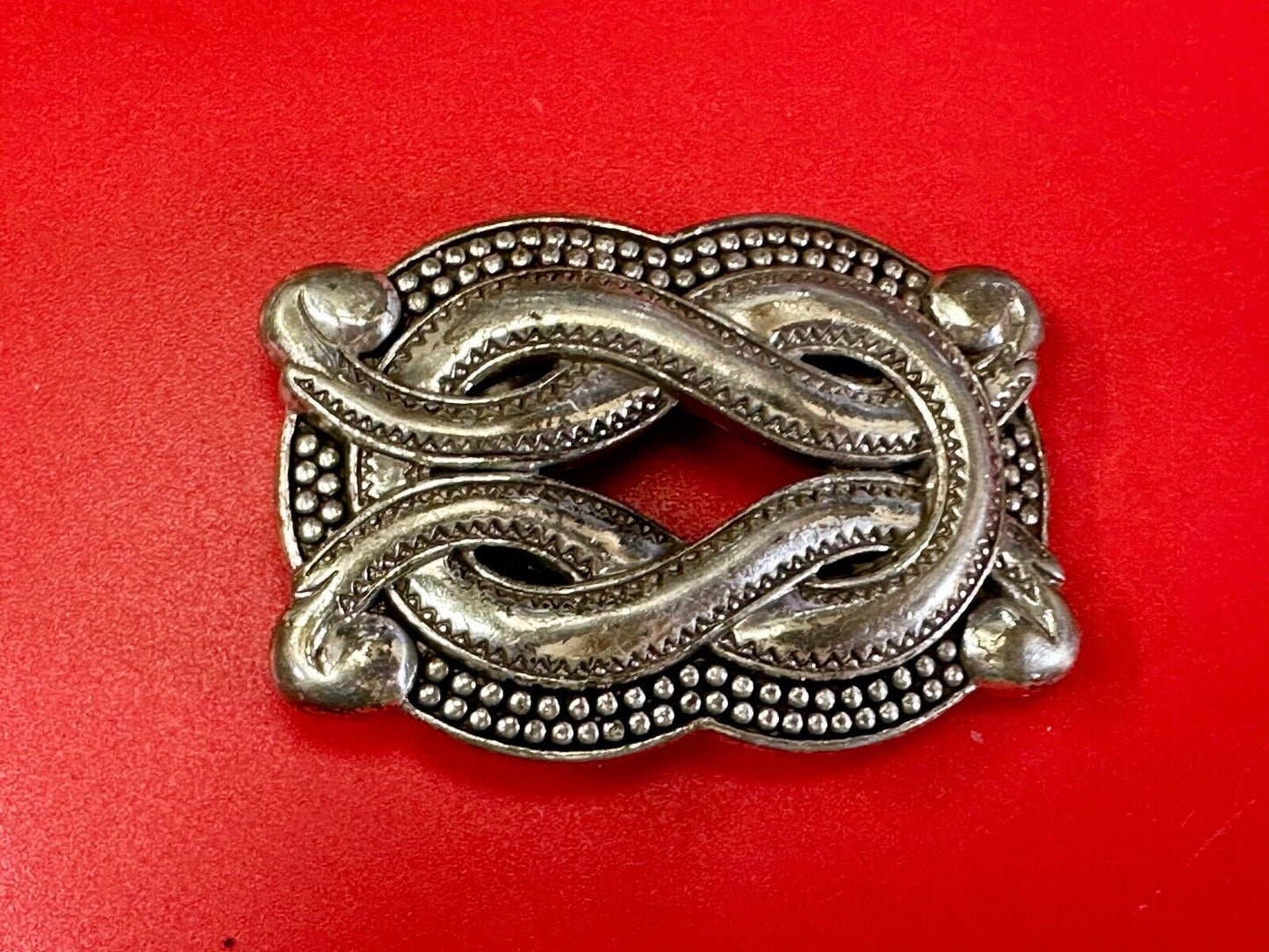 Vintage knot pattern see through silver tone belt buckle
