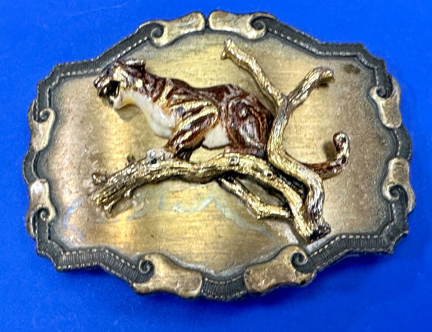 Vintage bobcat? leaping from branch western framed belt buckle by Raintree