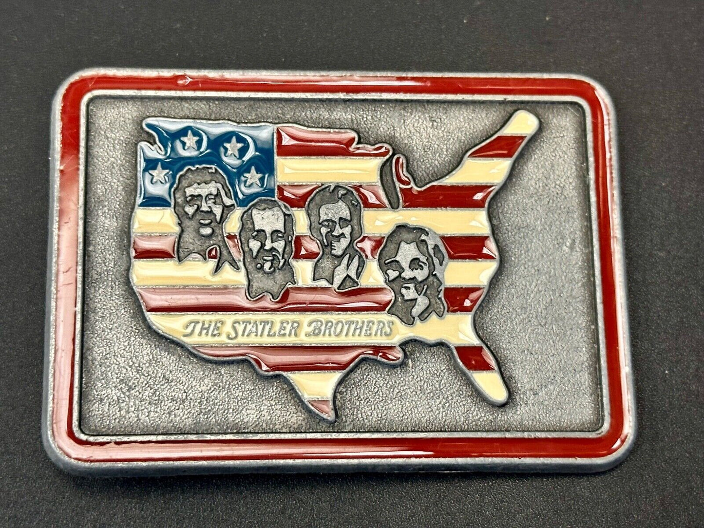 The Statler Brothers American Flag Country Shaped background band belt buckle