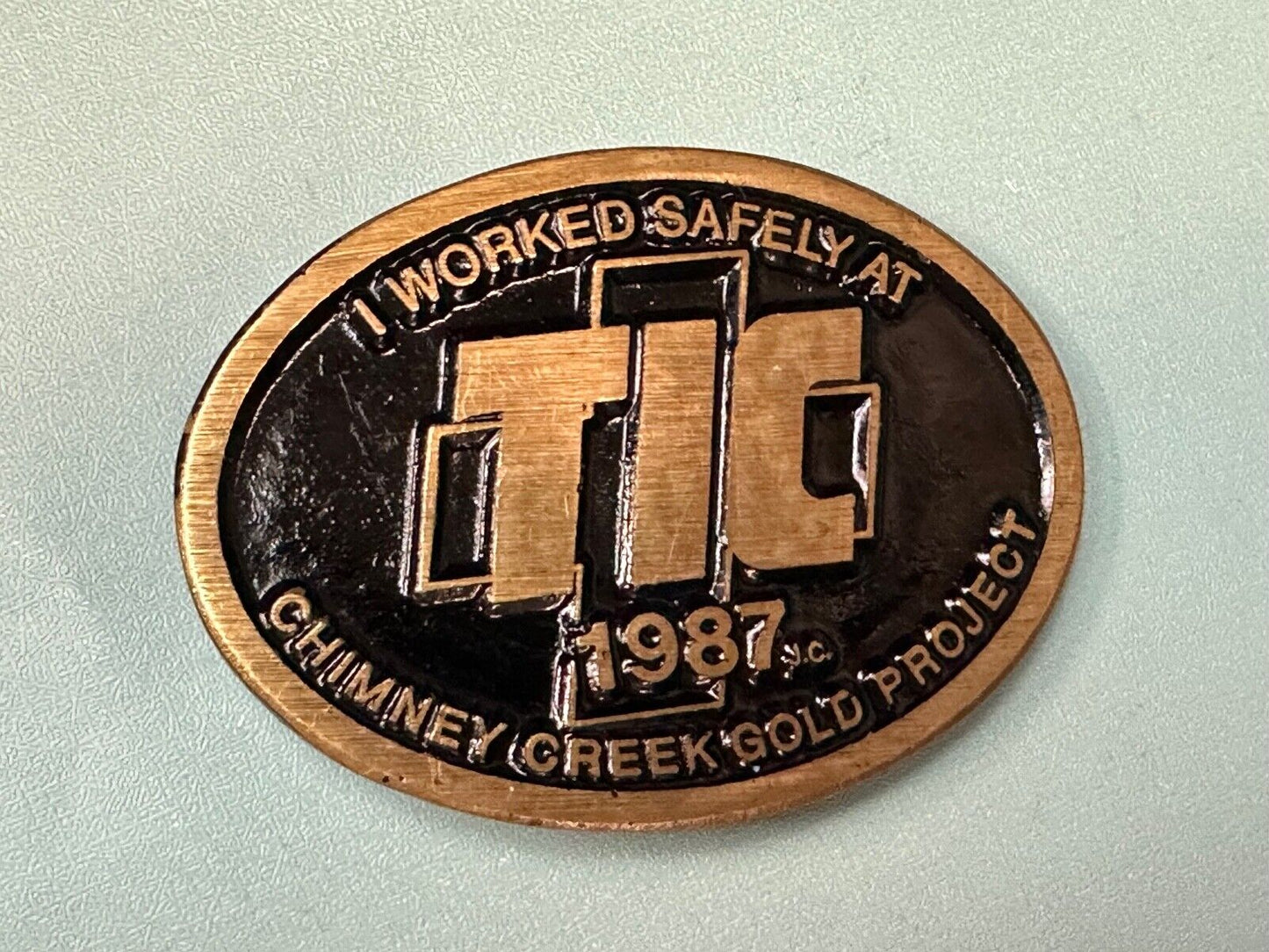 Vintage 1987 TIC Chimney Creek Gold Project Safety award brass belt buckle