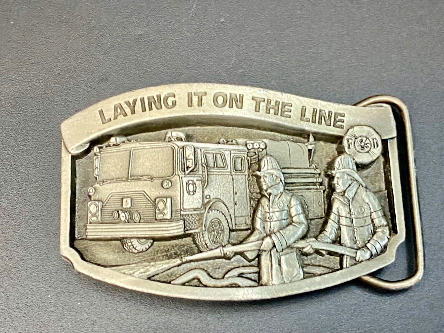 Vintage 1992, Laying it on the line fire department pewter belt buckle