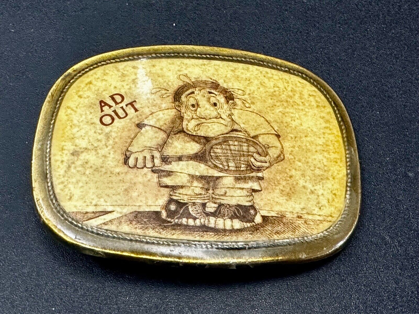 Vintage Cartoon Man AD OUT - Tennis Game Match Retro Sports Belt Buckle