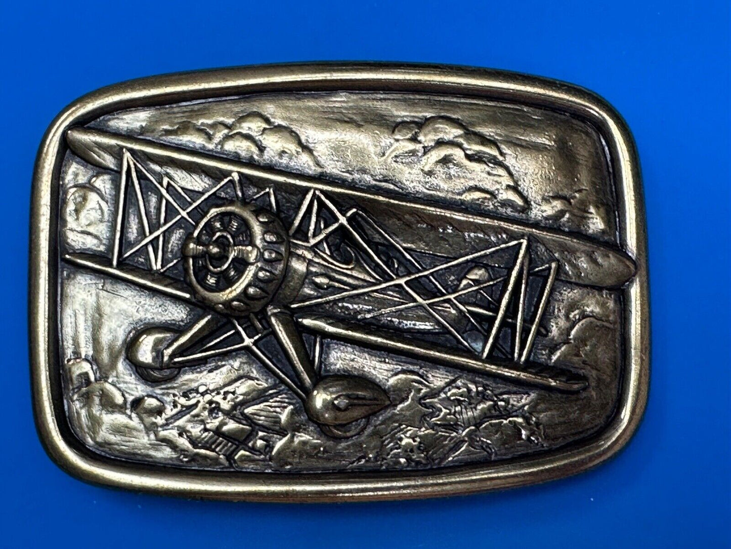 Bi-Plane Pilots Airplane brass tone Belt Buckle by Avon