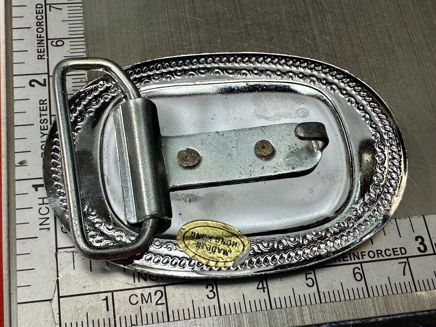 Vintage Covered Wagon on reflective oval two tone western belt buckle