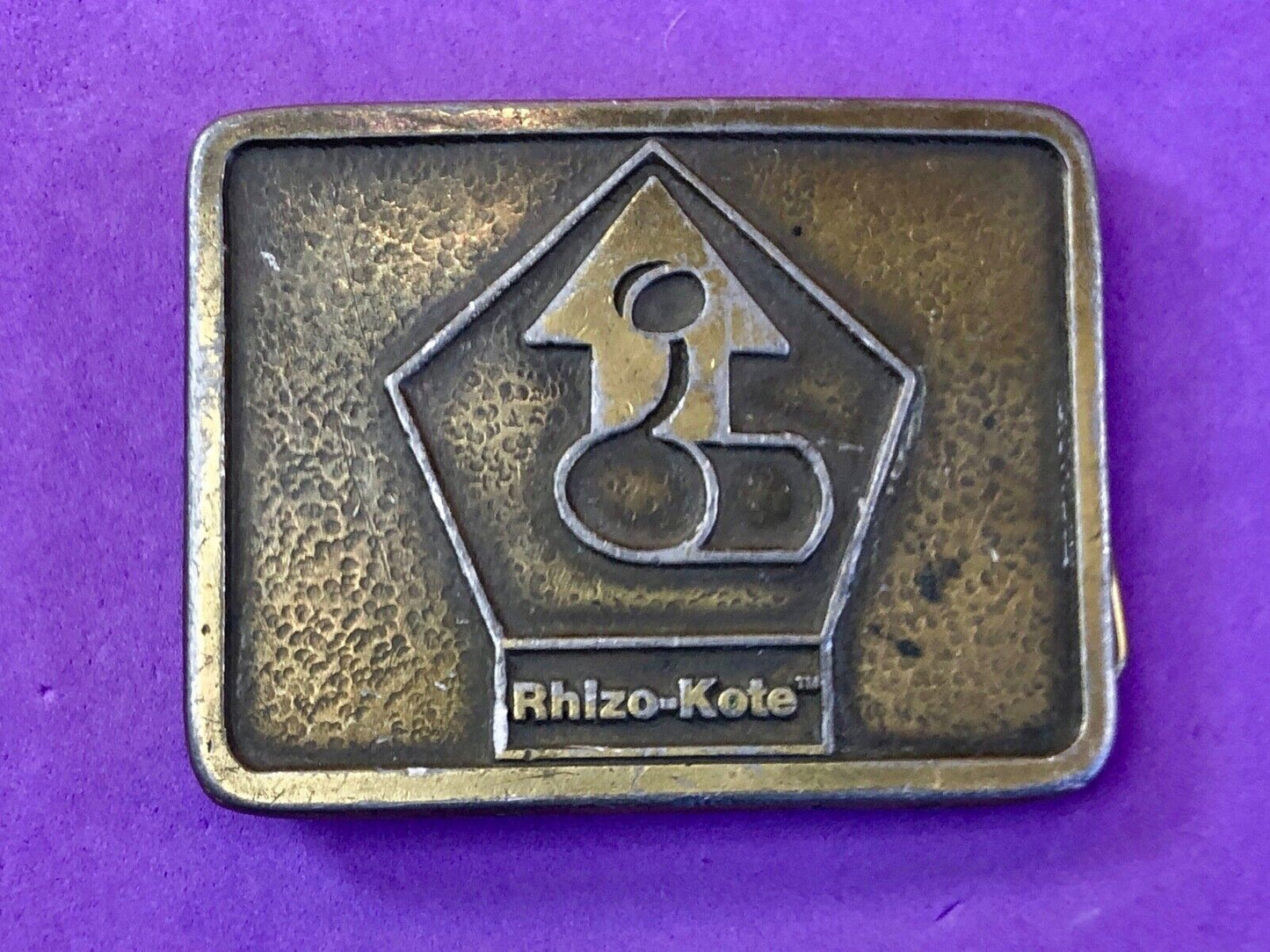 Vintage advertising Rhizo kote seal coating company belt buckle