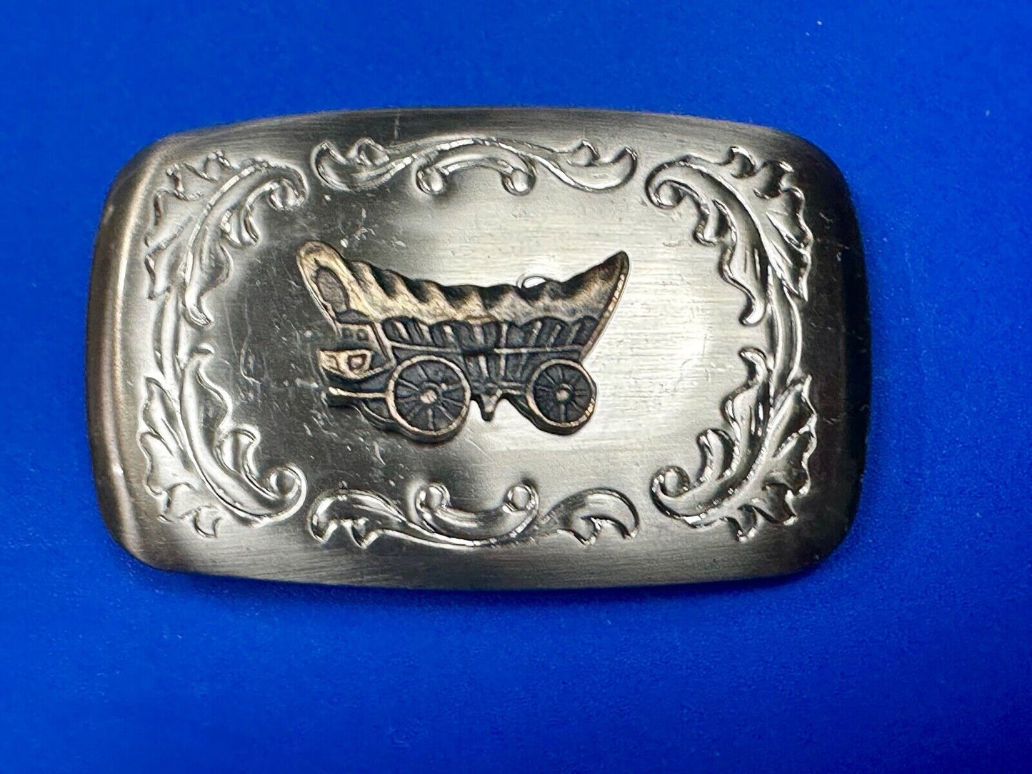 Vintage covered wagon two tone western mixed metal belt buckle