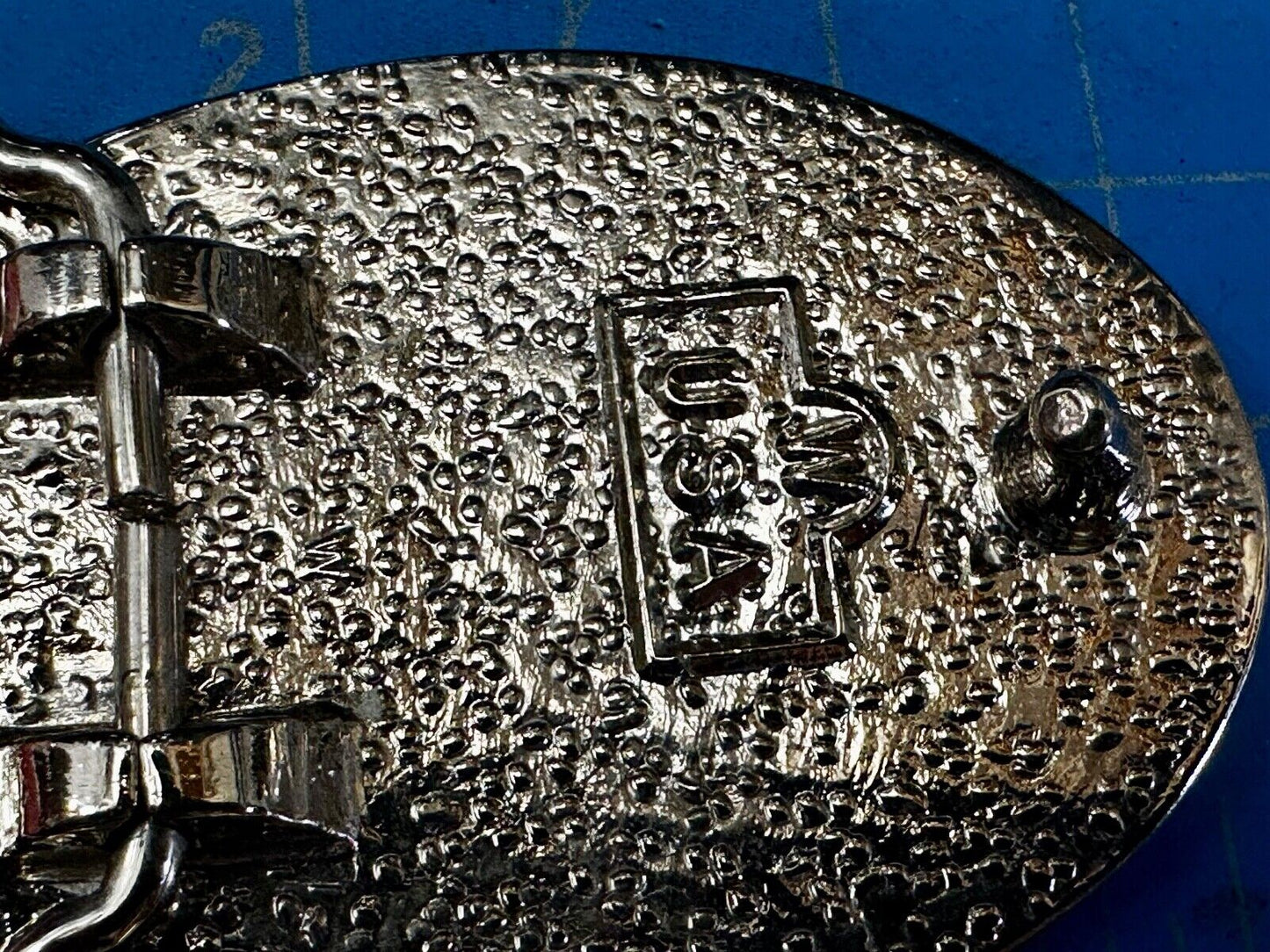 Black & silver tone Flying Eagle Oval Belt Buckle with "W" Mark. Made in U.S.A.