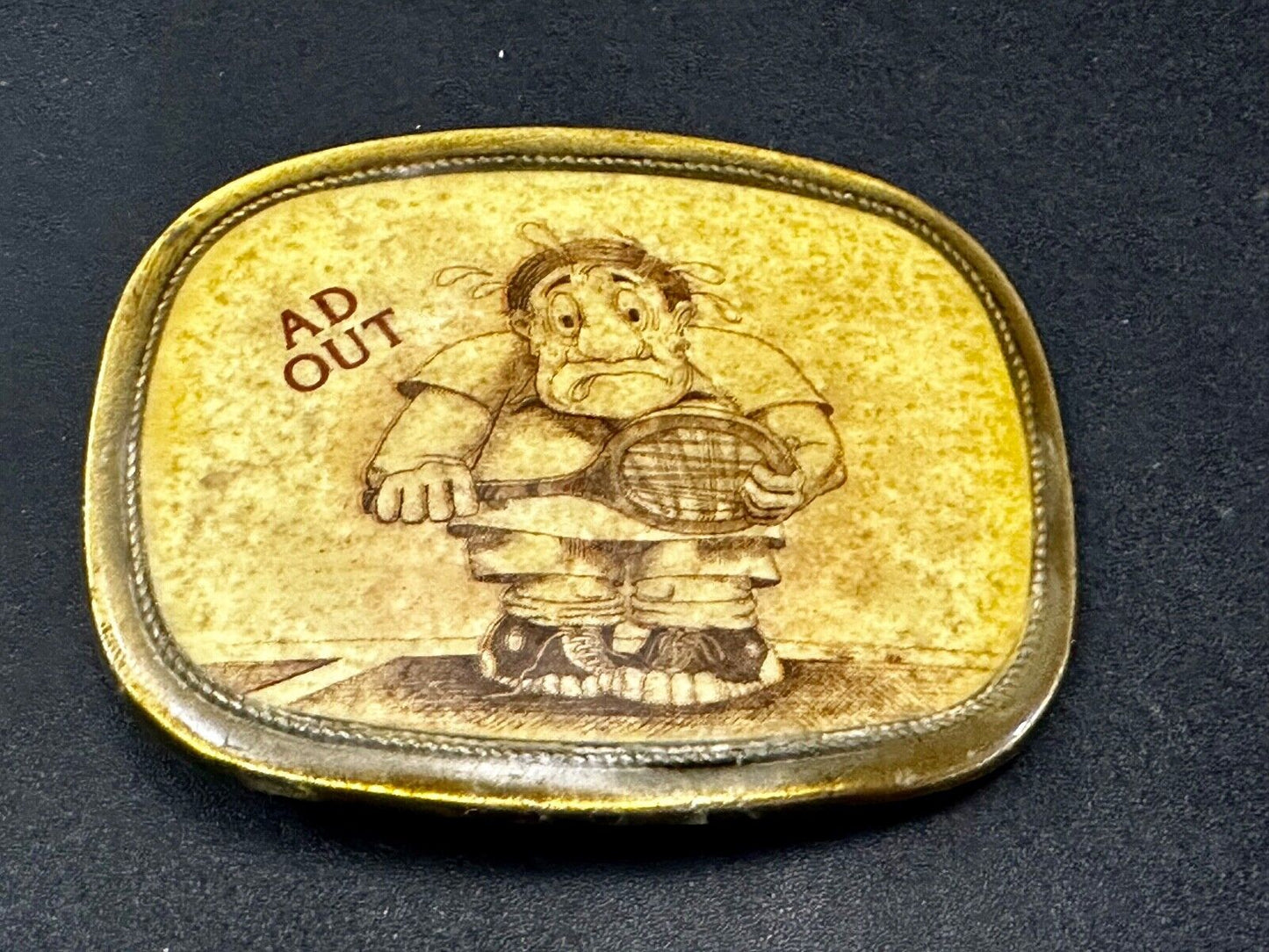 Vintage Cartoon Man AD OUT - Tennis Game Match Retro Sports Belt Buckle