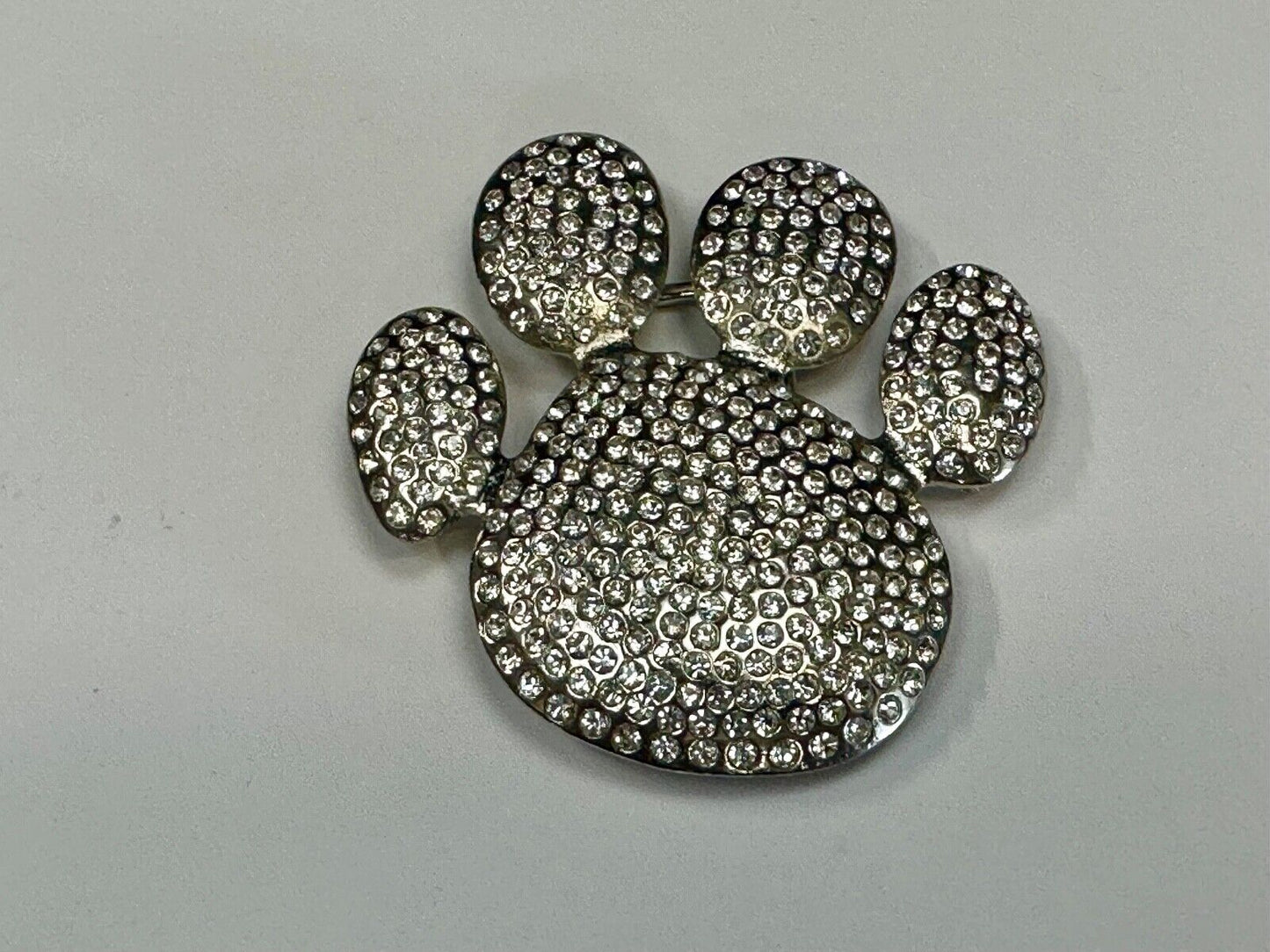 Bear Paw Print Silver Tone rhinestone covered belt buckle
