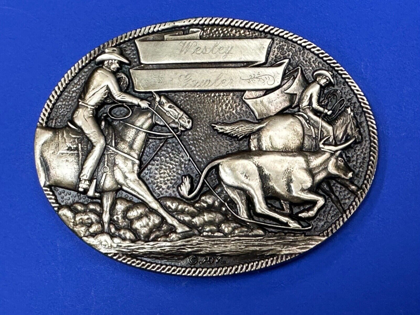 The Cattle Drive Western Rodeo Cowboys engraved award ribbon scroll belt buckle