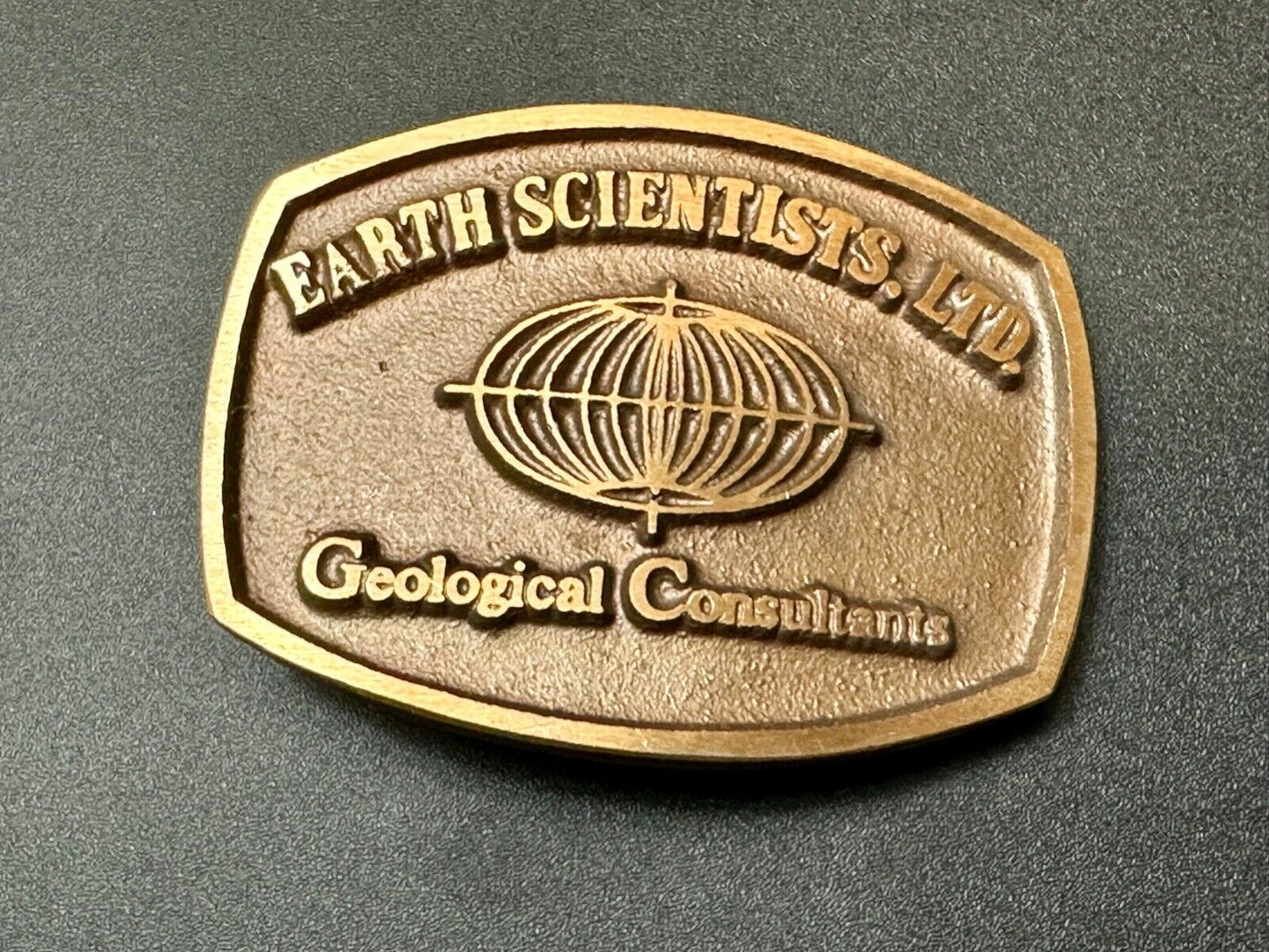 Vintage Earth Scientists LTD 0 Geological Consultants advertising belt buckle