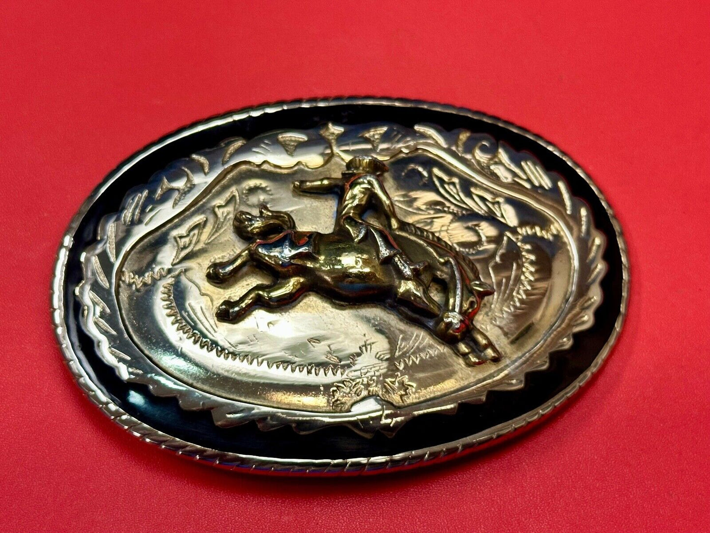 Beautiful Cowboy Saddle Bronc western black silver gold color belt buckle