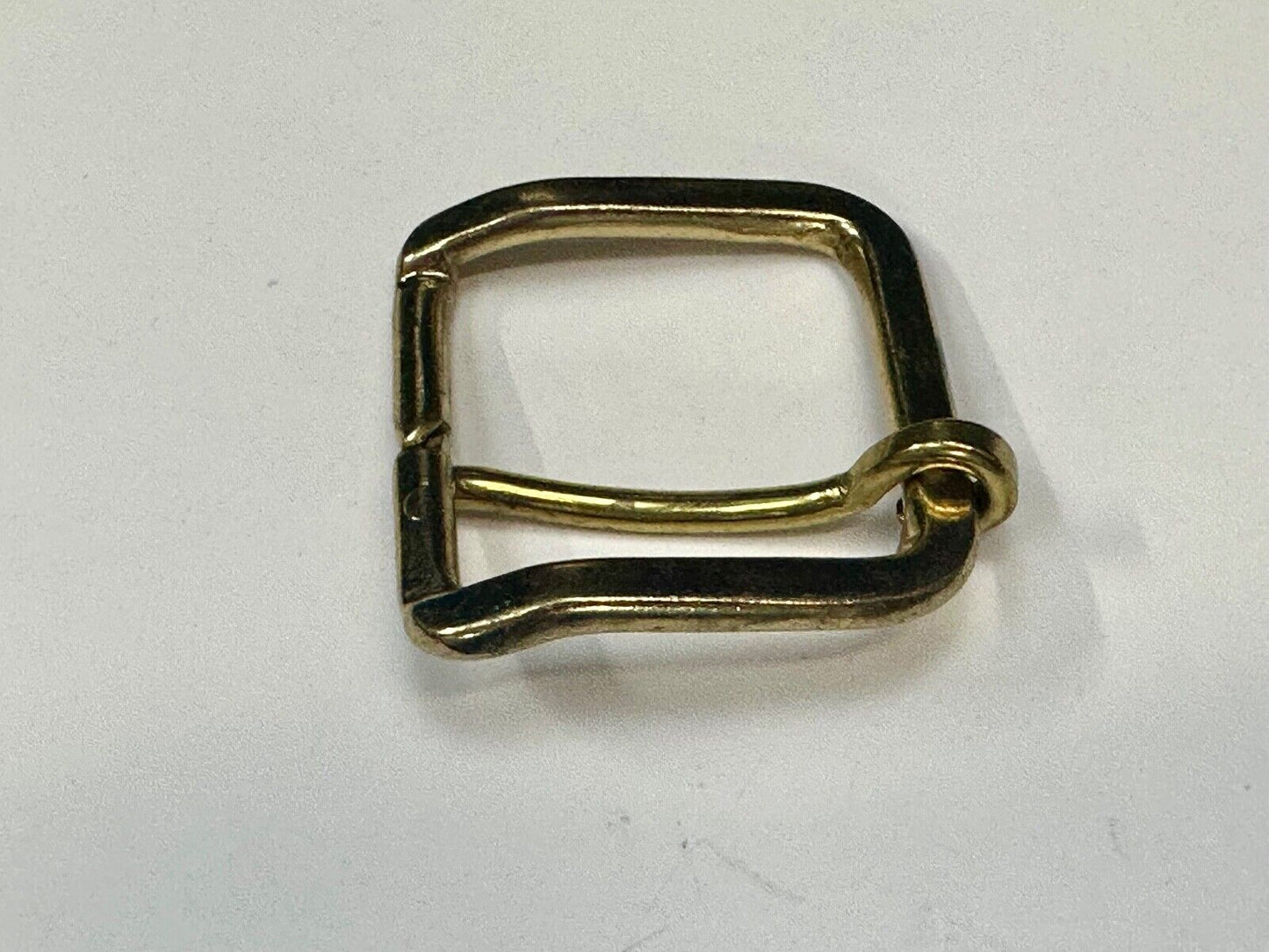 Vintage replacement belt buckle marked W with unique angle