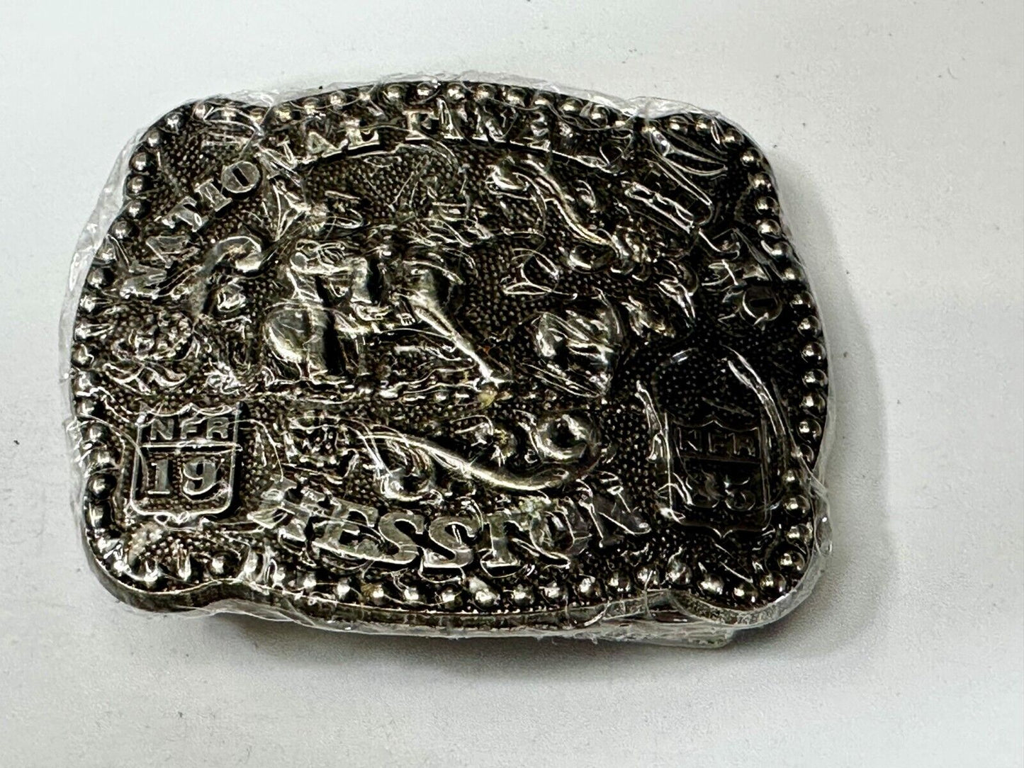 1985 Hesston National Finals Rodeo NFR Rodeo Cowboys NOS Youth Size Belt Buckle