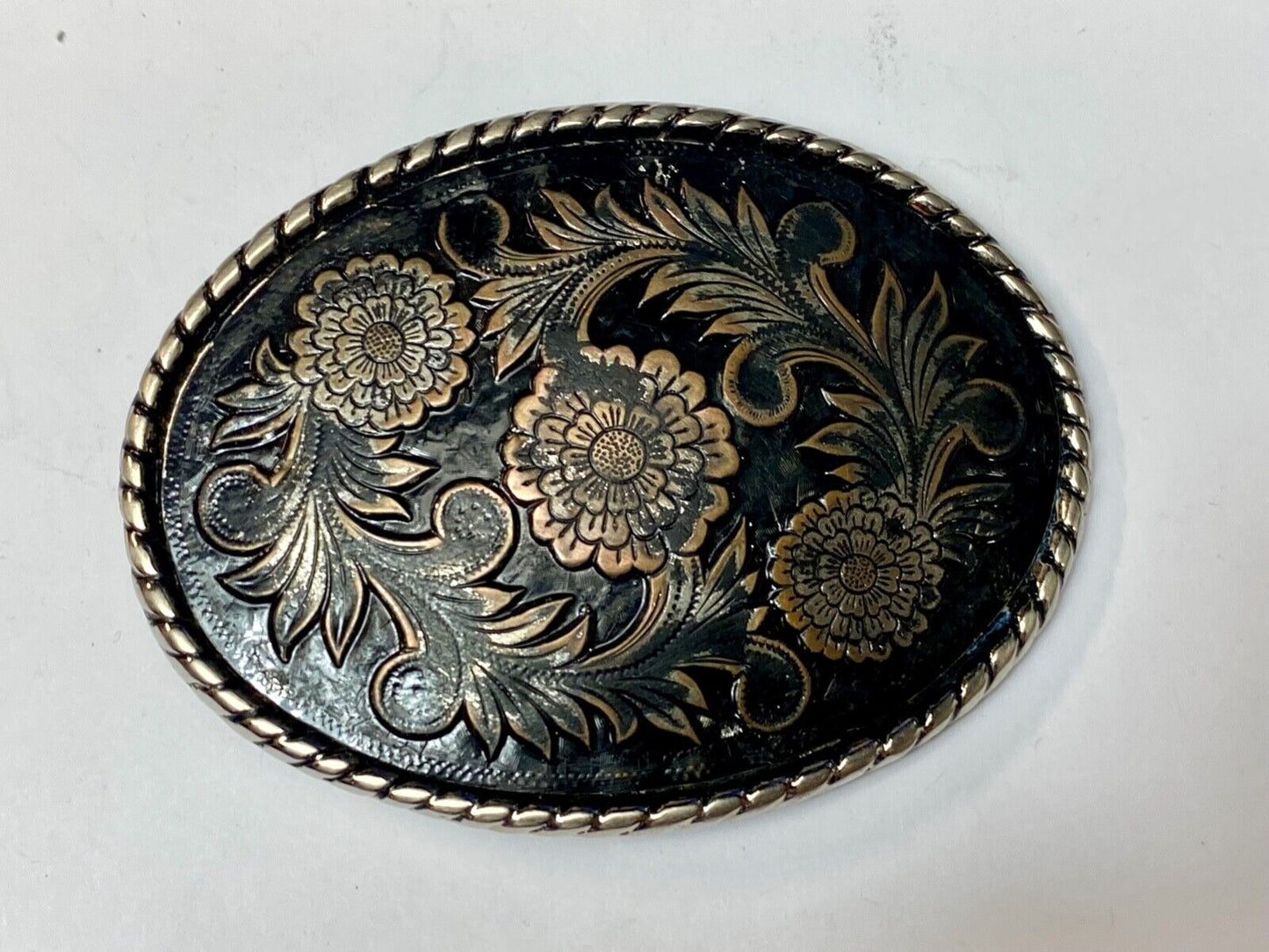 Beautiful flower design black & copper color oval outlined western belt buckle W
