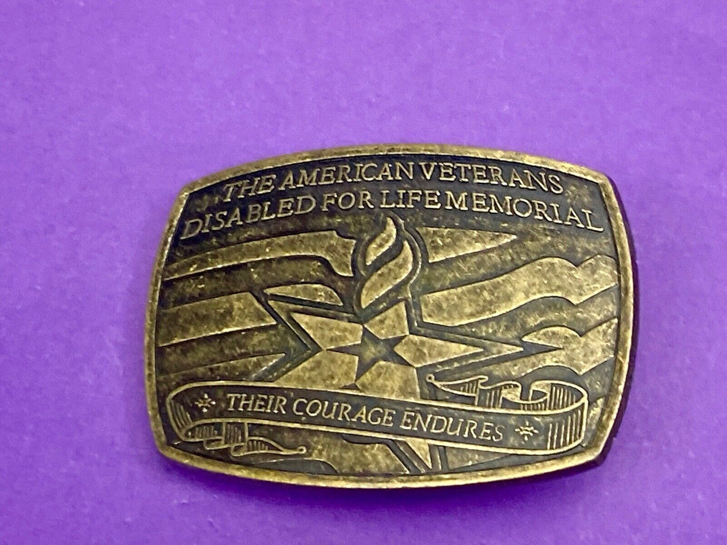 The American Disable Veteran Memorial Belt Buckle Their Courage Endures.