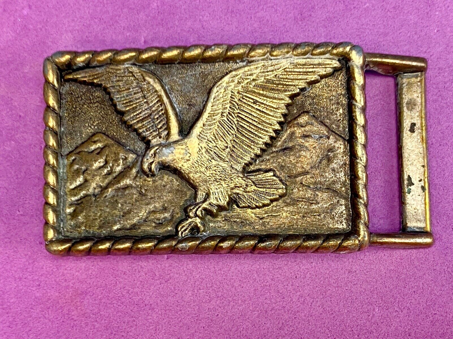Vintage eagle flying over mountains belt buckle
