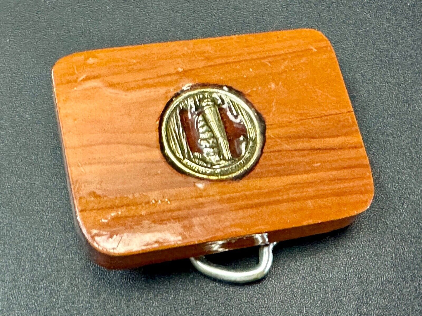 Artisan wood belt buckle with inlaid Luary Caverns cave token coin