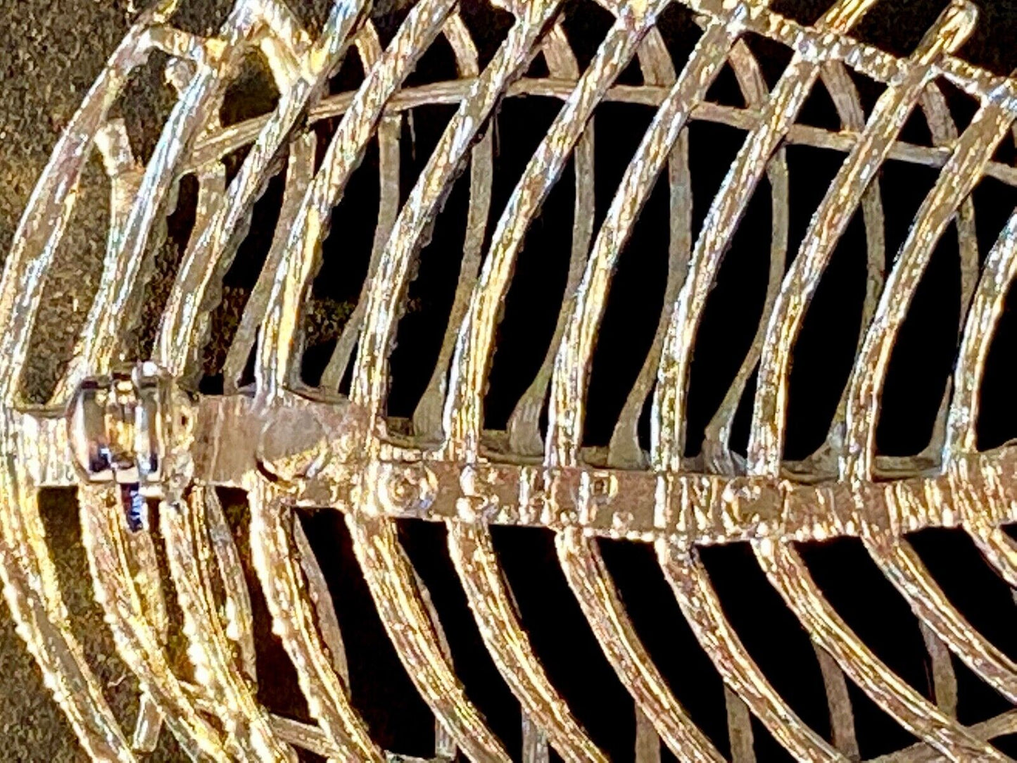 SWP INC signed Gold tone skeleton see through leaf brooch