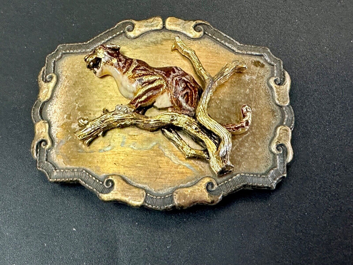 Vintage bobcat? leaping from branch western framed belt buckle by Raintree