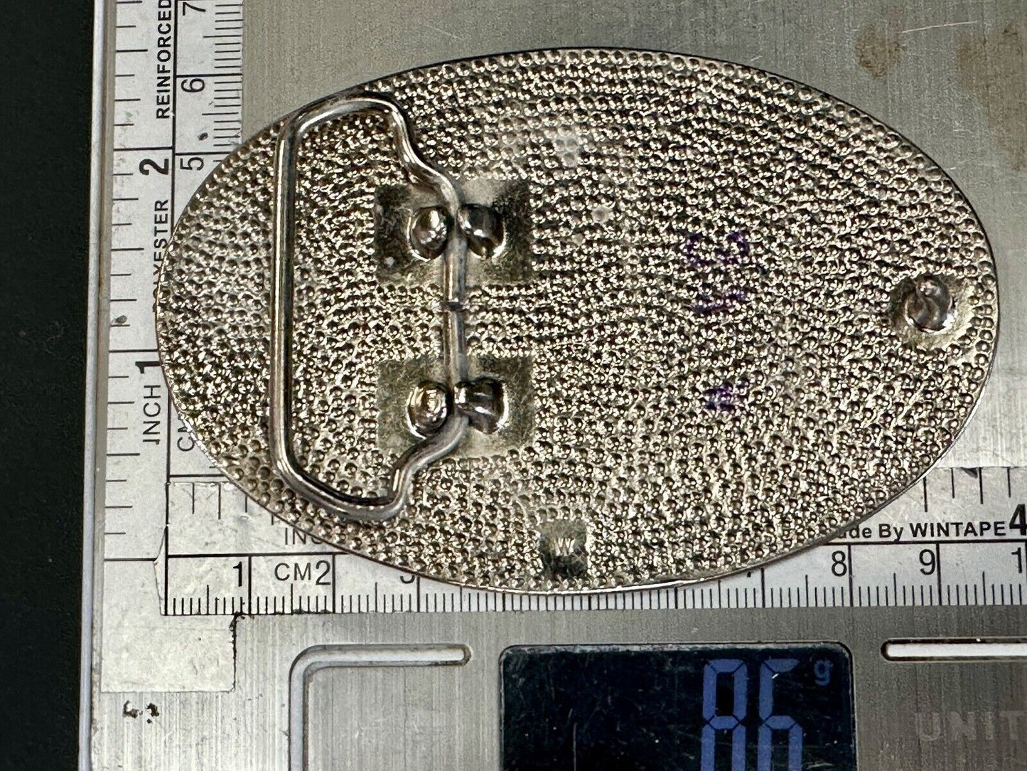 Vintage etched figure 8 pattern oval silver tone belt buckle
