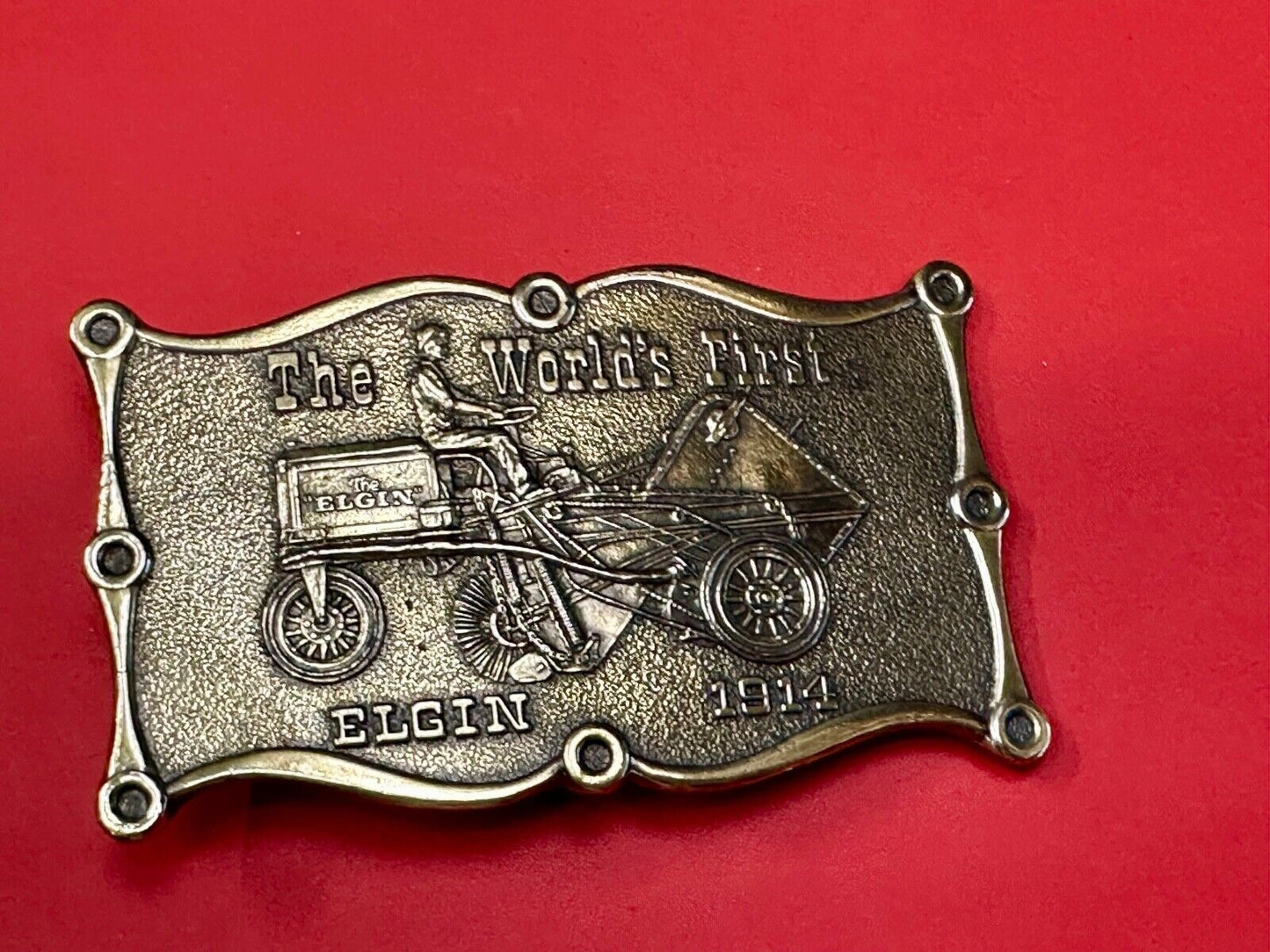 The Elgin, The worlds first tree sweeper commemorative belt buckle by Lewis