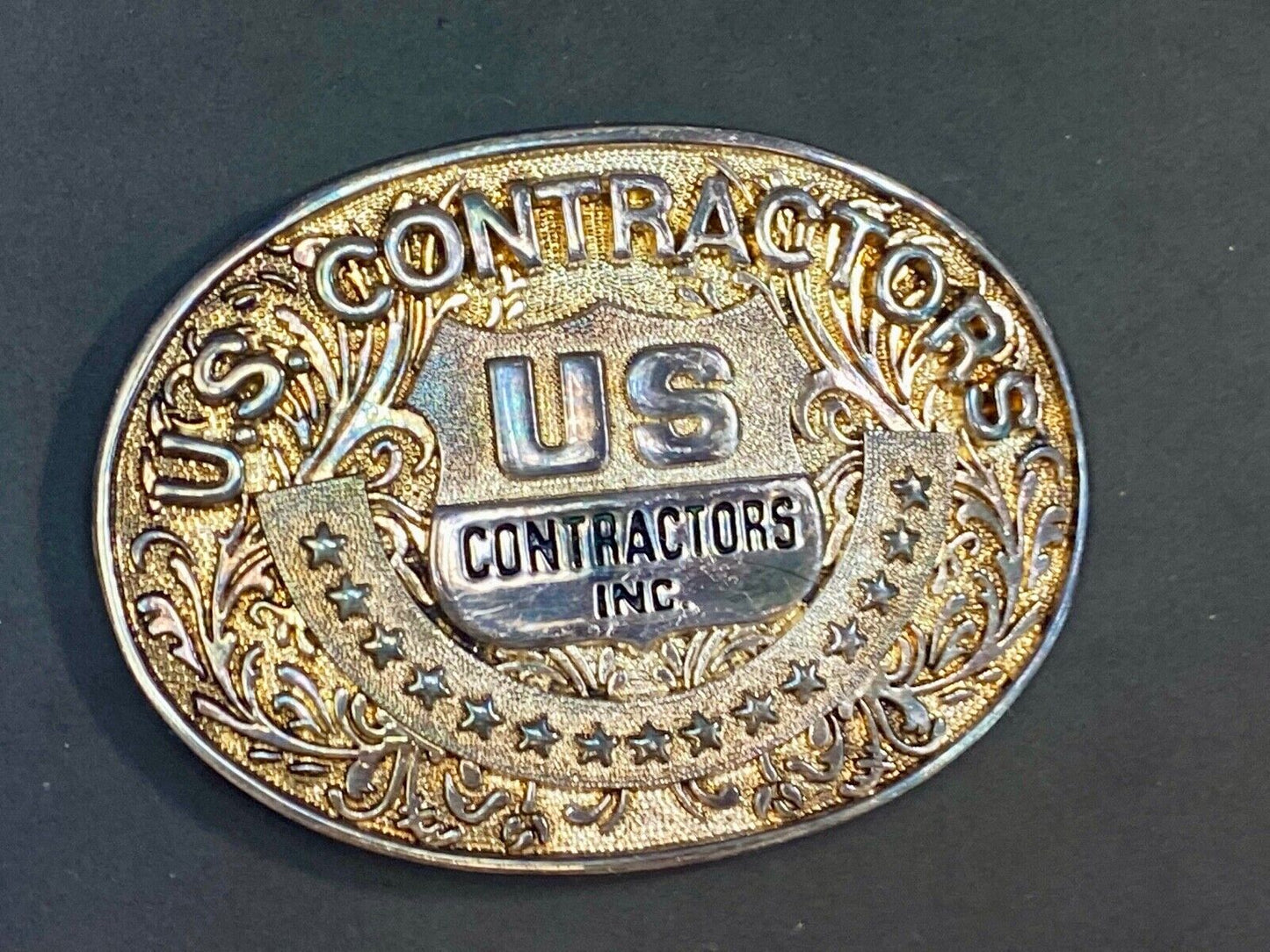 Us Contractors Inc Western Flower Swirl Belt Buckle By O.C. Tanner