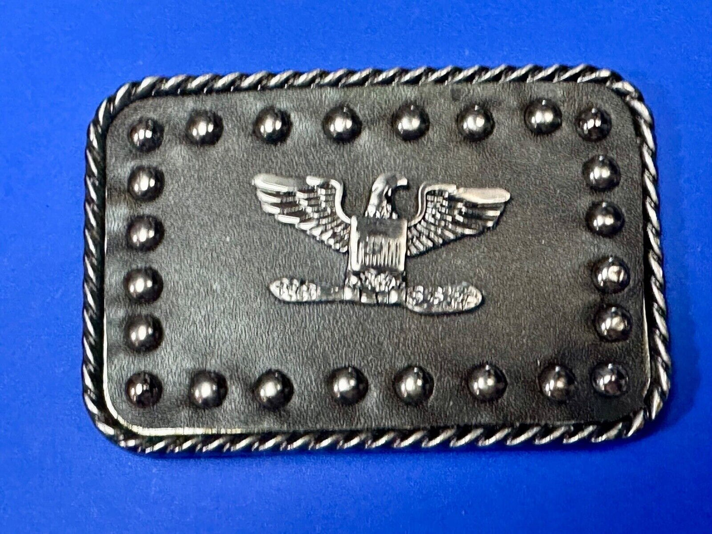 American Eagle - biker style studded black leather background belt buckle