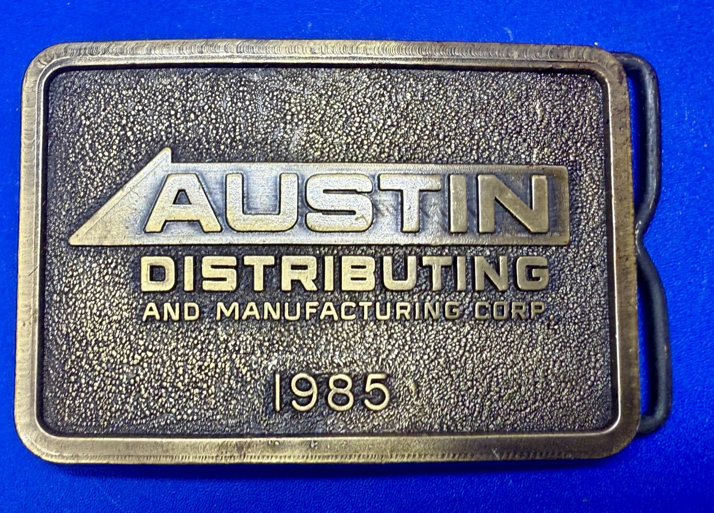 Austin Texas Distributing and Manufacturing Corp 1985 NOS RJ Belt Buckle